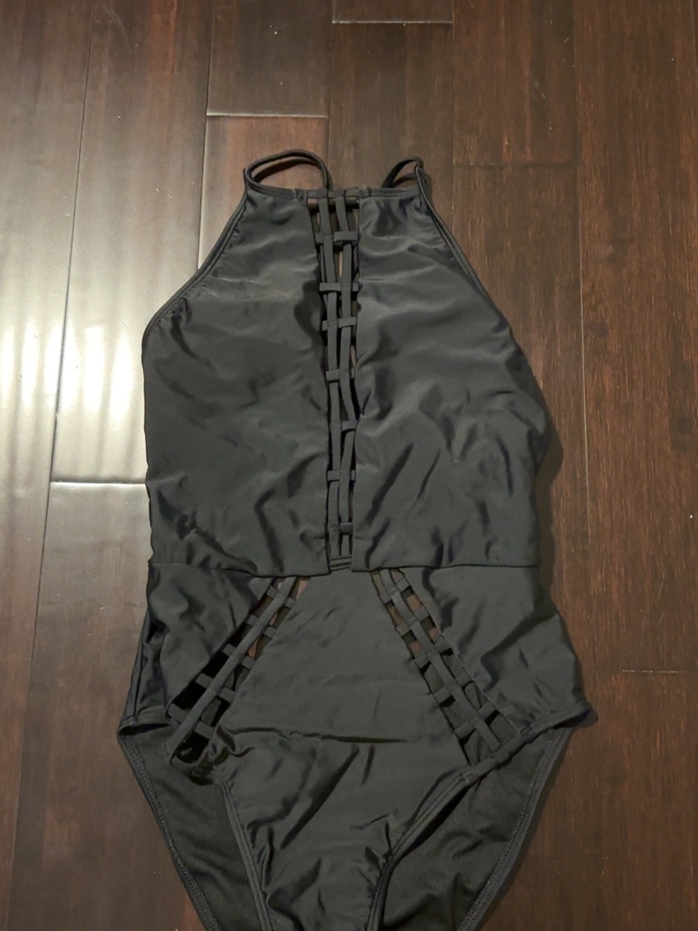 High-Neck Black One-Piece Swimwear with Lattice Details